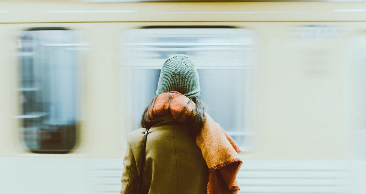 Girl in front of moving train